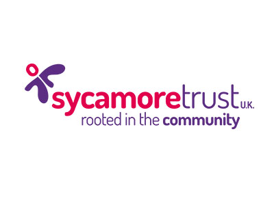 Sycamore Trust U.K. logo with a stylized figure and the tagline “rooted in the community.”