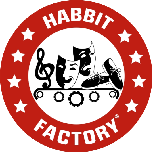 Circular logo with red border and white stars. Text reads 'HABBIT FACTORY'. Center features performing arts symbols: a treble clef, theatrical masks, and dance shoes on a stage with gears.