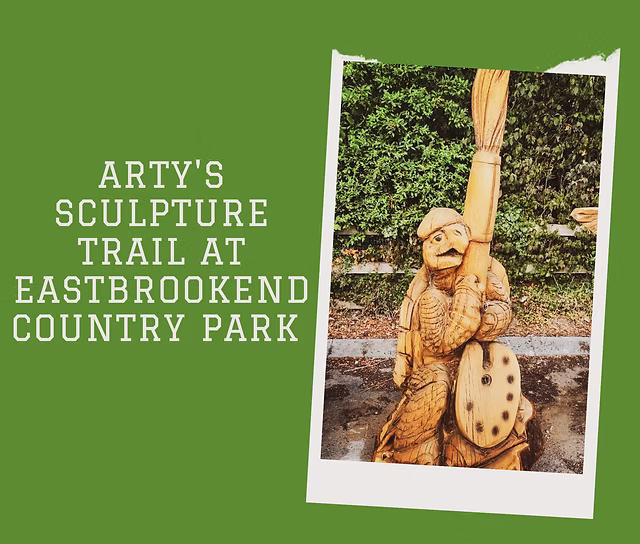 A wood carving in a park.