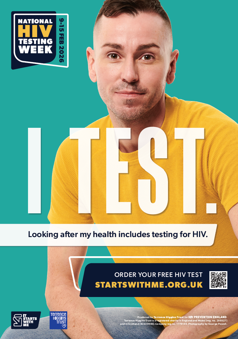 A young white male is depicted sitting down smiling at the camera with the words 'I TEST' in capital letters across the poster. The subtitle reads 'Looking after my health includes testing for HIV.'